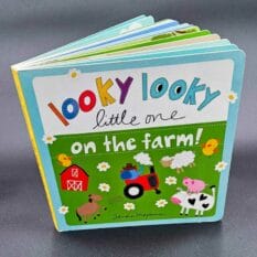 book cover for the lap board book Looky Looky Little One: On the Farm! by Sandra Magsamen