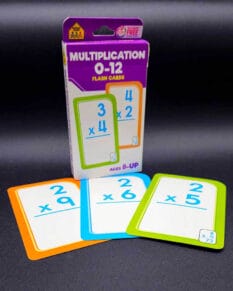 Multiplication flash cards set with cards saying "2x9", "2x6", and "2x5" in front.