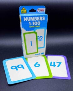 Numbers 1-100 flash cards set with cards saying "99", "6", and "47" in front.