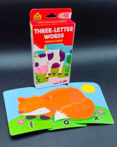 Three-Letter Words Puzzle Cards set with cards placed in front that show a fox.